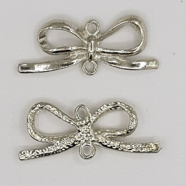 Breloque N&oelig;ud N&deg;16 breloque noeud papillon ruban en m&eacute;tal argent