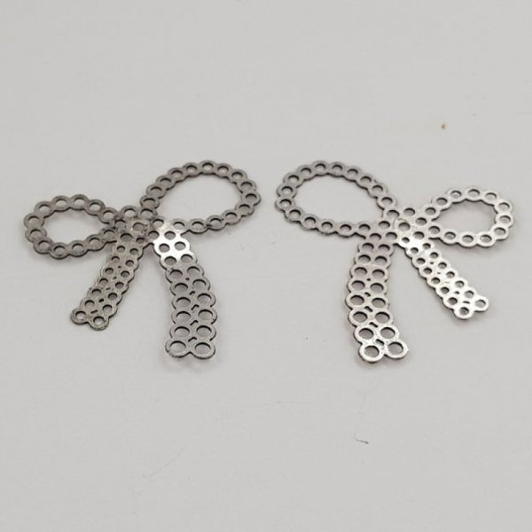 Breloque N&oelig;ud N&deg;24 breloque noeud papillon ruban en m&eacute;tal Argent