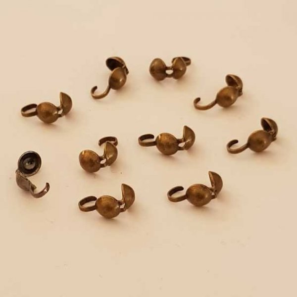 Cache n&oelig;ud GM Bronze x 10 pi&egrave;ces