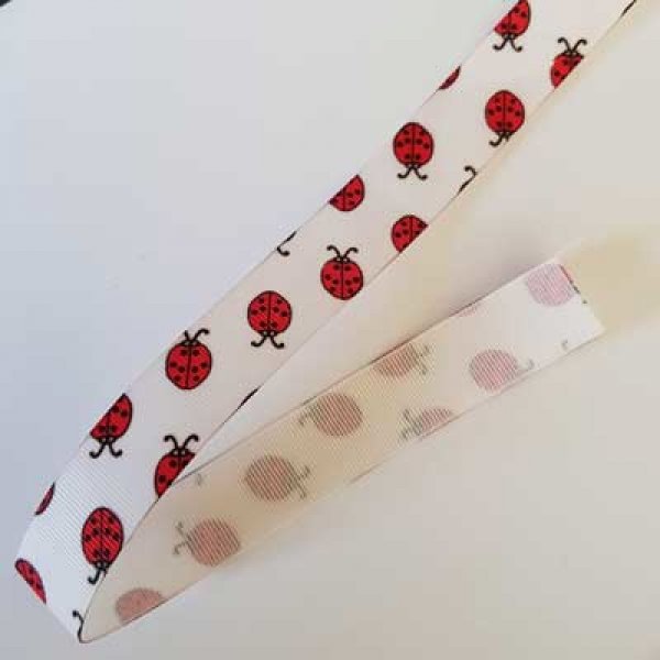 Ruban gros grain coccinelle rouge fond blanc N&deg;01 de 22 mm au m&egrave;tre