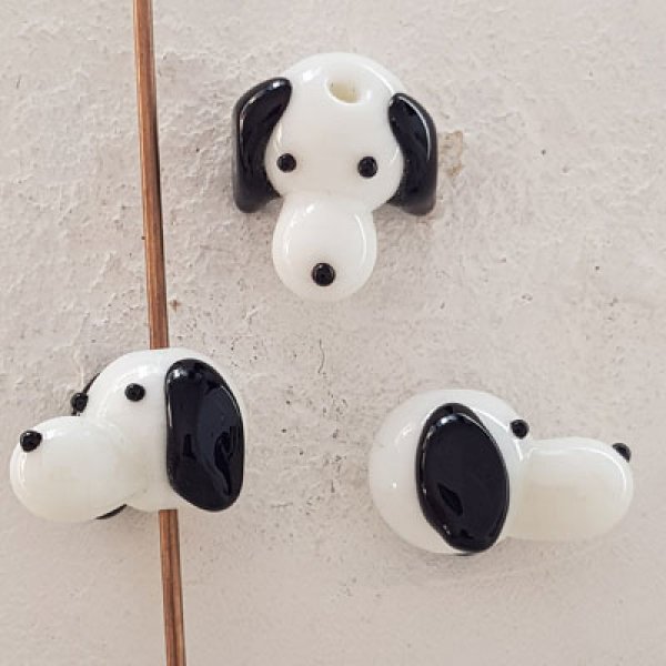 T&ecirc;tes de chiens par 10