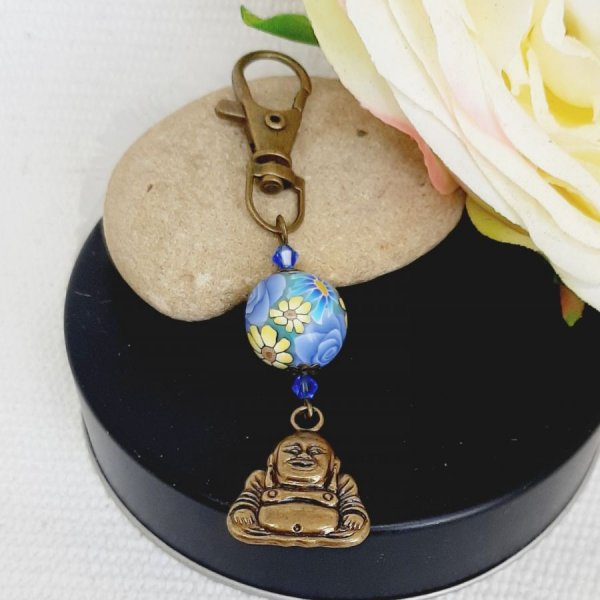 porte cl&eacute; pendentif bouddha bronze et sublime perle violet faite &agrave; la main avec marguerites jaunes/jaune