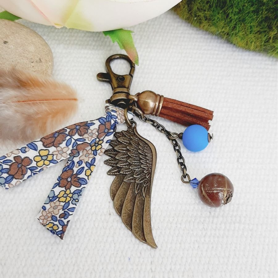 Porte clé ou bijou de sac avec pendentif aile d'ange couleur
