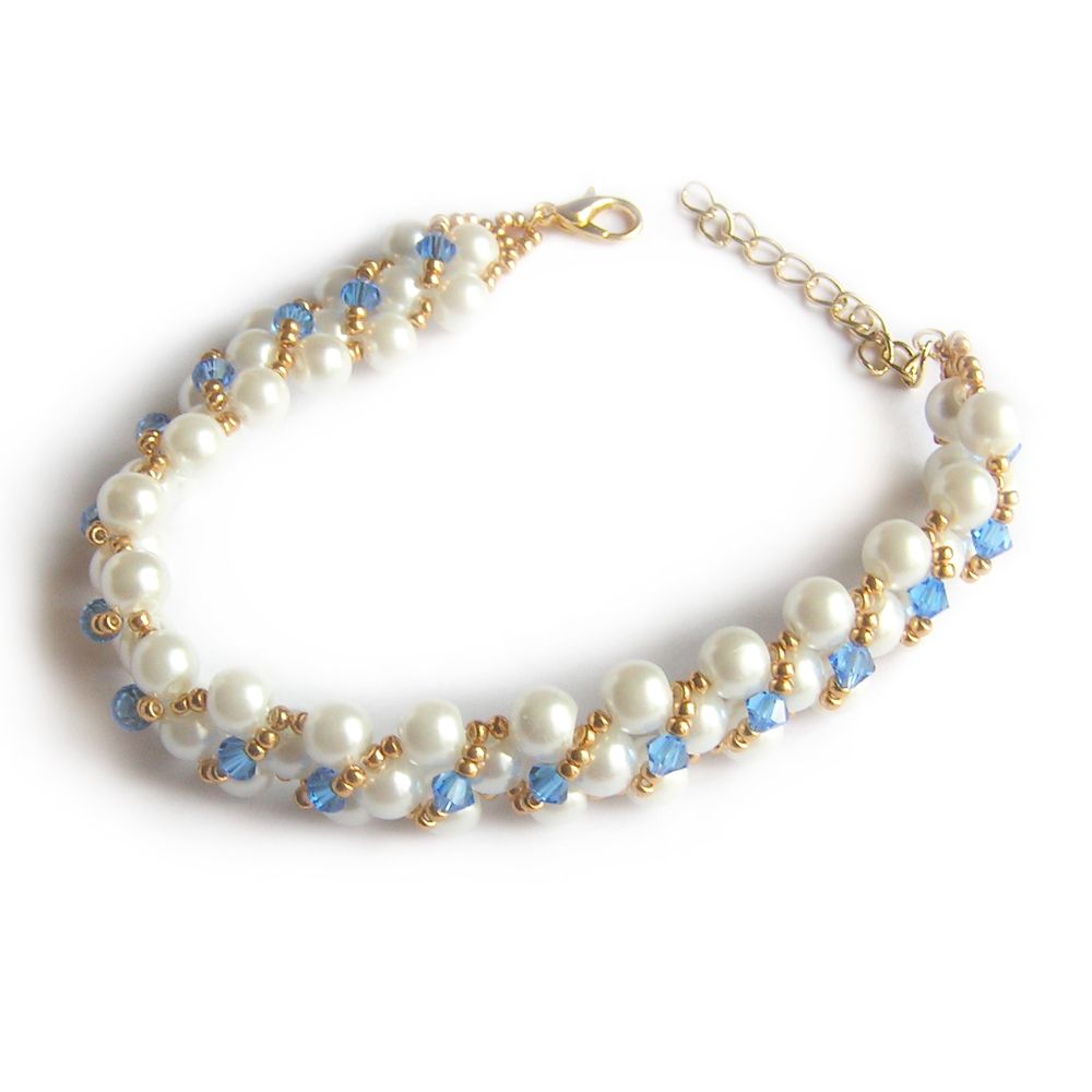 Boucles d'oreilles cristal swarovski bleu saphir perles blanches et or soirée mariage cérémonie plaqué or