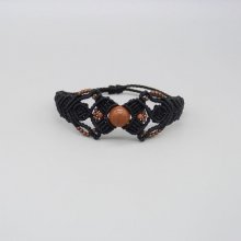Bracelet en micro-macramé noir avec une perle centrale "pierre de soleil"