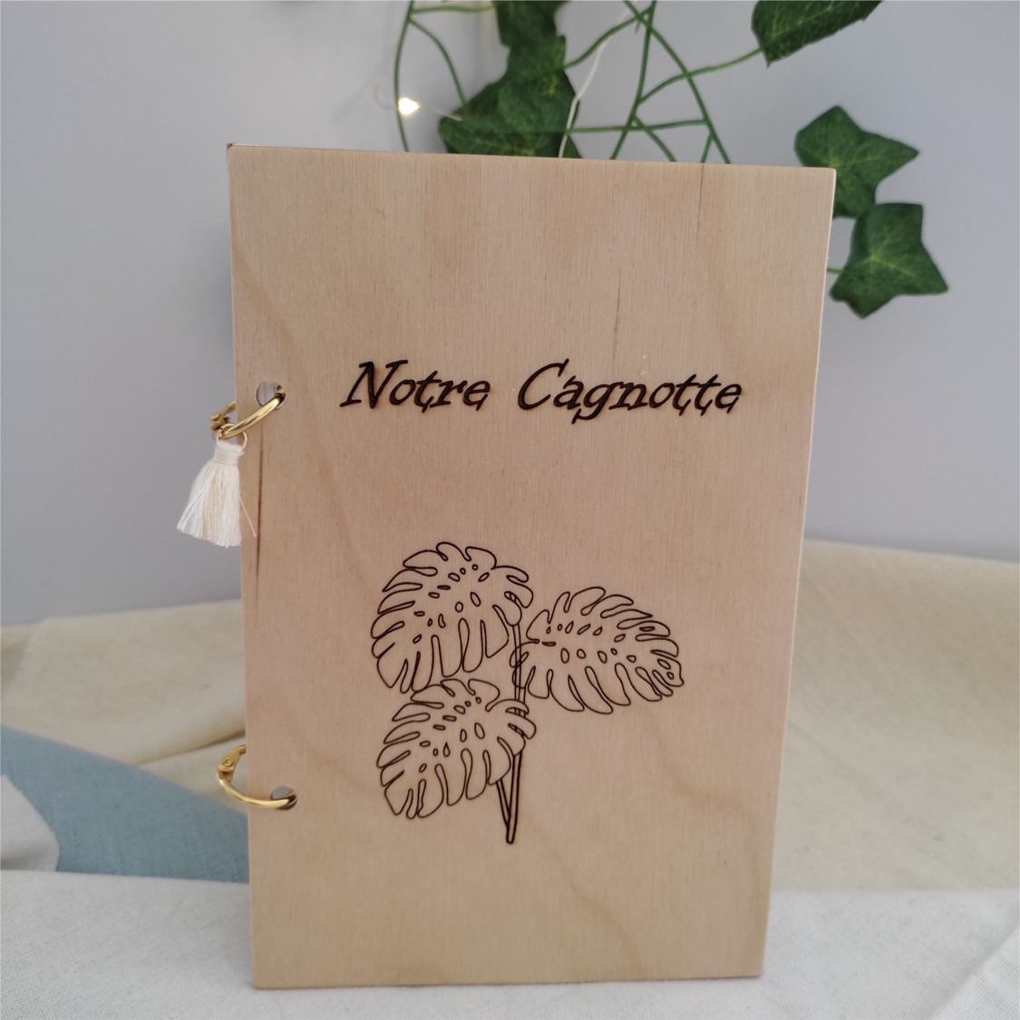 Carnet budget loisirs en bois gravé