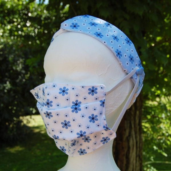 Bandeau enfant coloris bleu avec boutons de chaque côté pour les masques