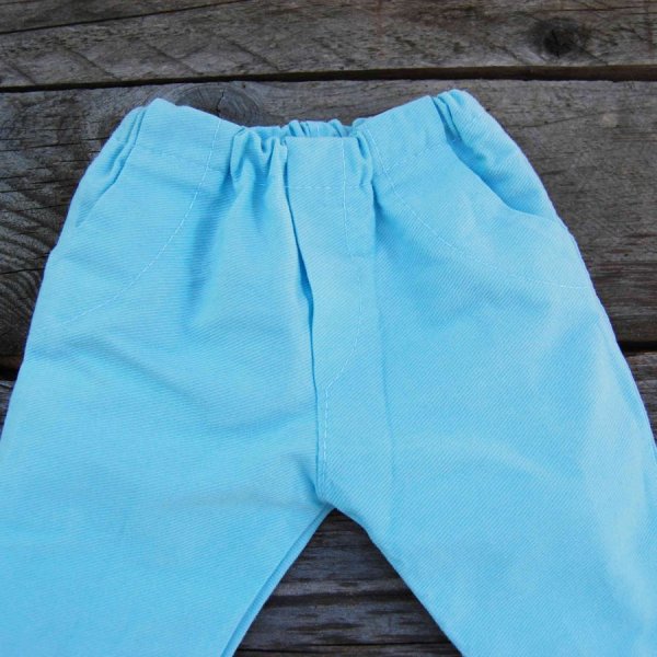 Pantalon poupée de couleur turquoise