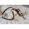Collier Noir Sacré vintage Haute-Couture brodé avec des cristaux de Swarovski, un ruban organza et des rocailles Miyuki