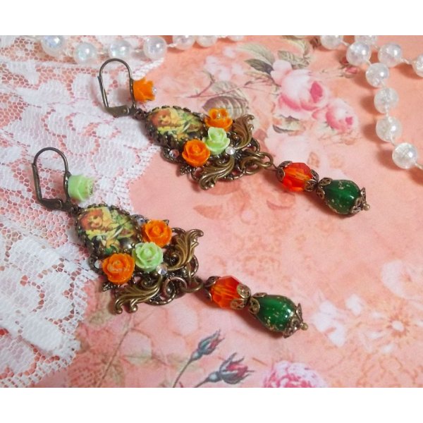 BO Fée Aloes Potiron créées avec des cabochons loupes, des roses en résine et des cristaux