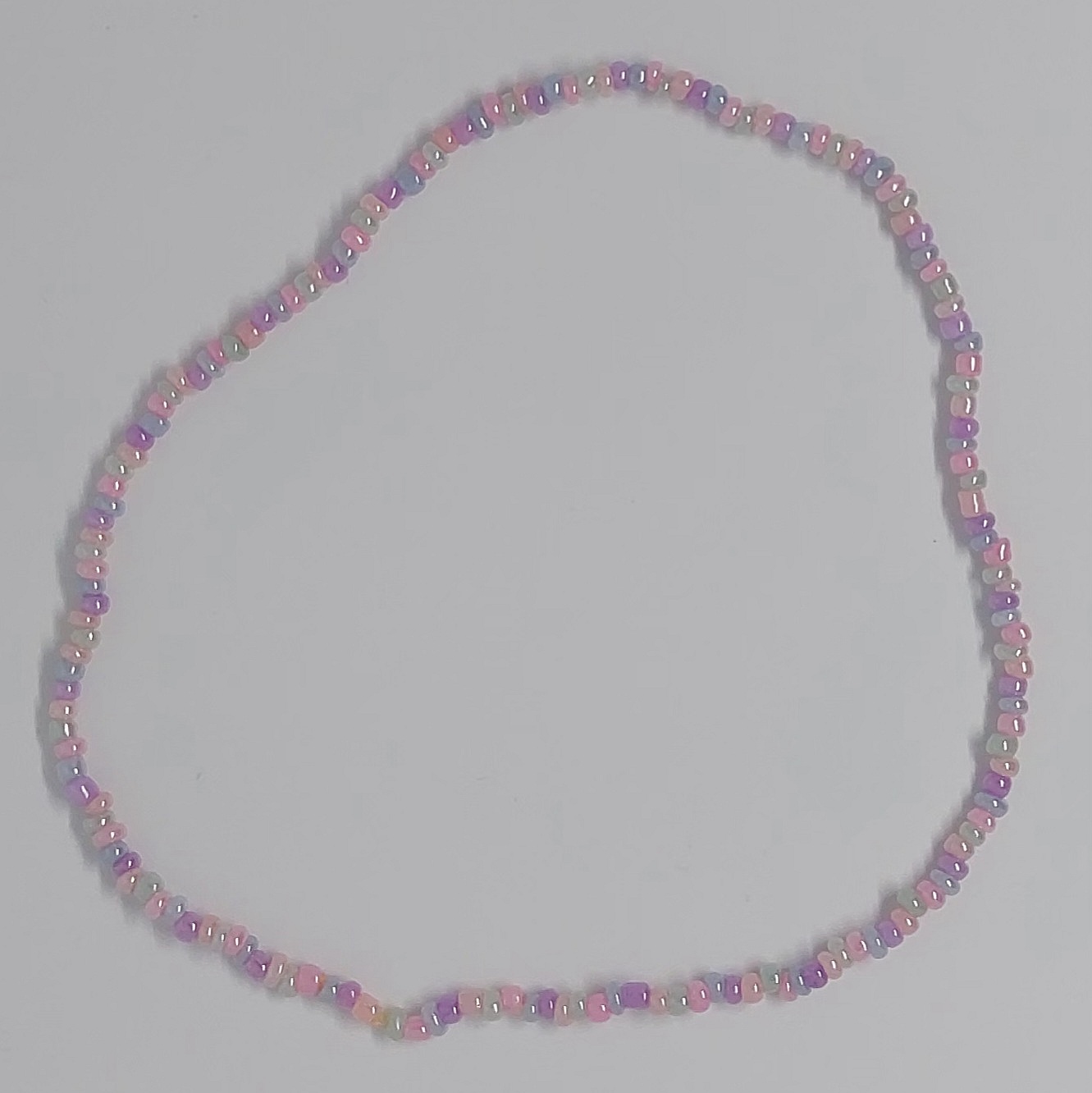 Ras du cou sir&egrave;ne en perles pastel