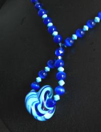 Collier Spirales bleu turquoise